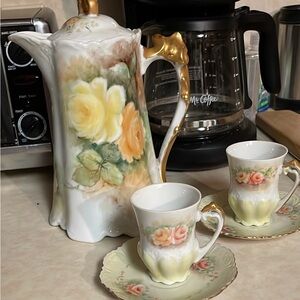 Exceptional Floral Design, Hand-painted Porcelain Coffee Set with Gold Accents